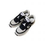 CHANEL WOMEN SNEAKERS BLACK AND WHITE G39230